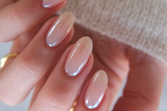 "Soft pink almond nails with pearly glazed finish, minimalist and elegant for bridal and everyday looks"